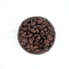 A cup full of whole bean Arabica coffee Colombia French 